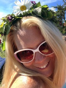 Enjoying the Swedish Midsummer Tradition with a crown of flowers in my hair. 